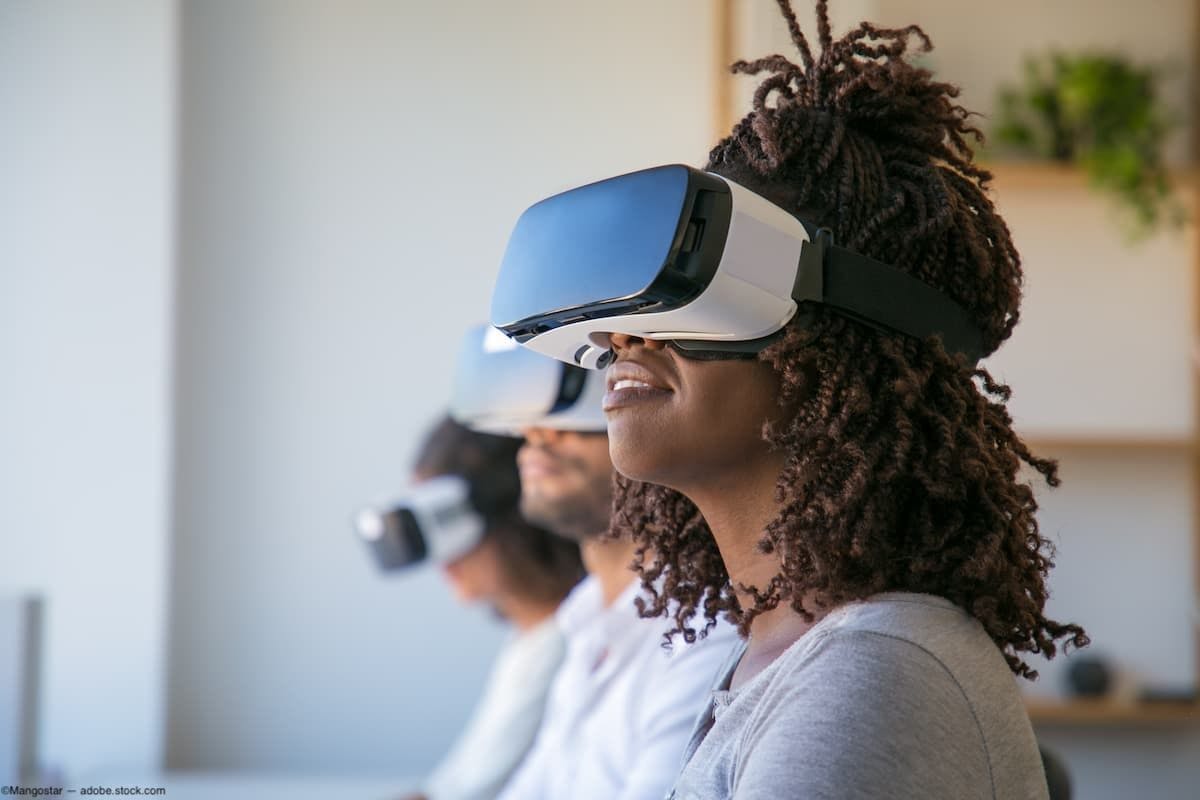 Group of people wearing VR headsets Image credit: ©Mangostar - adobe.stock.com