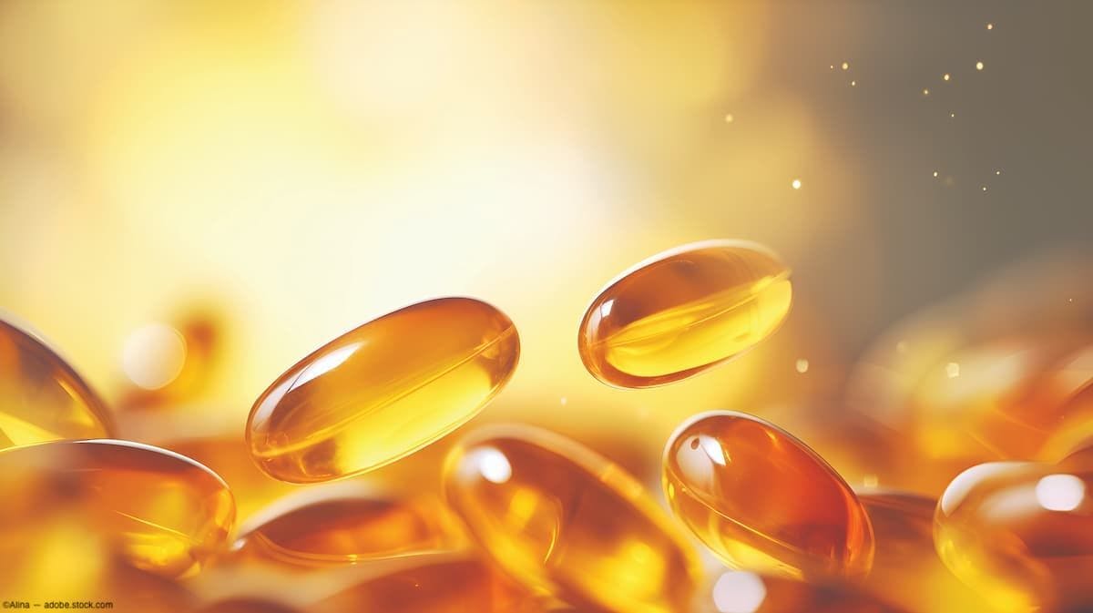 Pile of omega 3 pills against yellow backdrop Image credit: ©Alina - adobe.stock.com