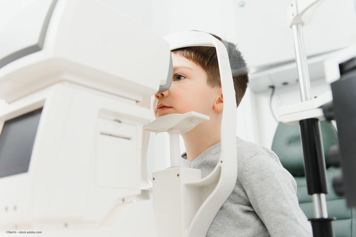 young boy is screened for autism via eye exam - Image credit: stock.adobe.com—Serhii