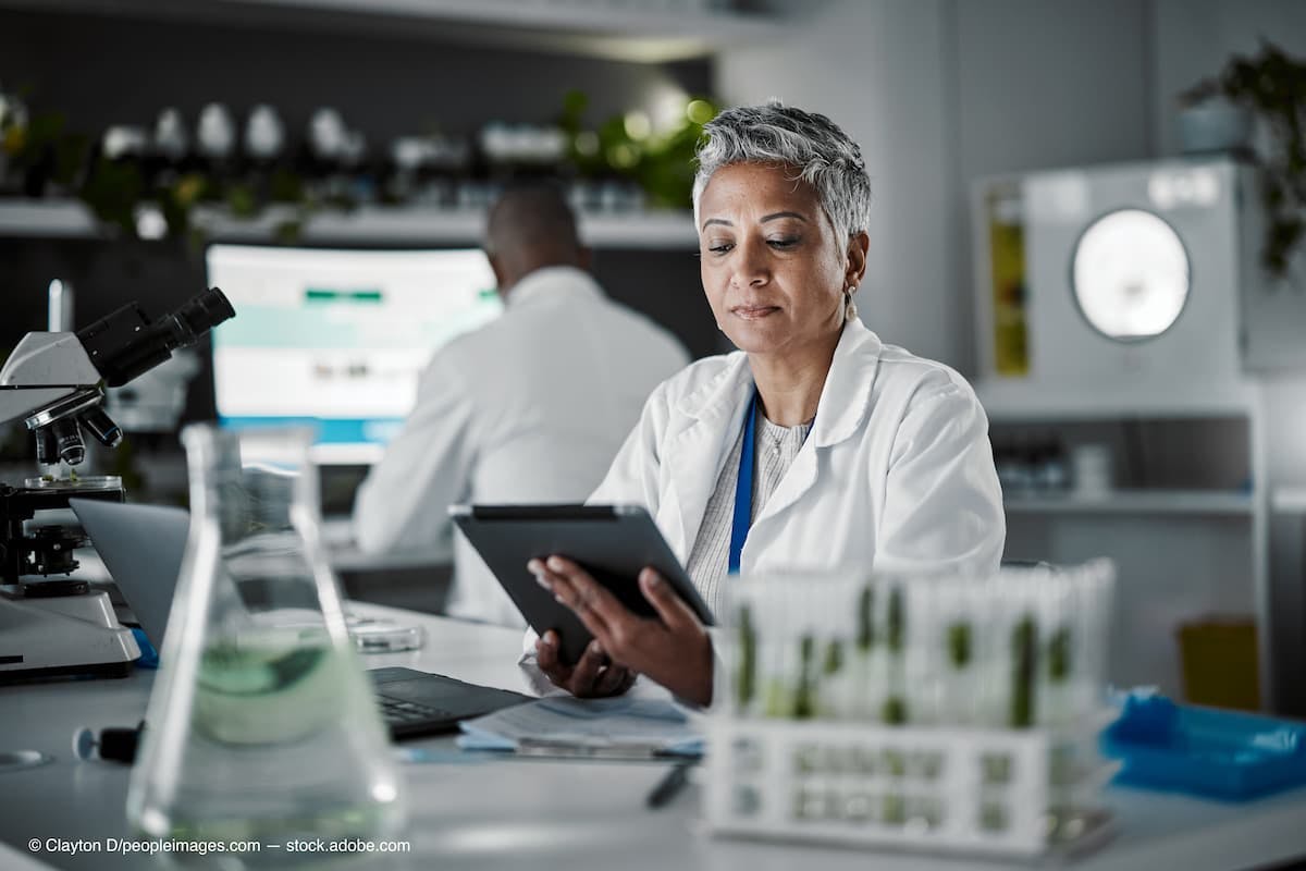 Woman, thinking or tablet in biology laboratory in plant science, medical research or gmo food engineering. Mature scientist, worker or technology for green sustainability, growth innovation or ideas (Adobe Stock / Clayton D/peopleimages.com)