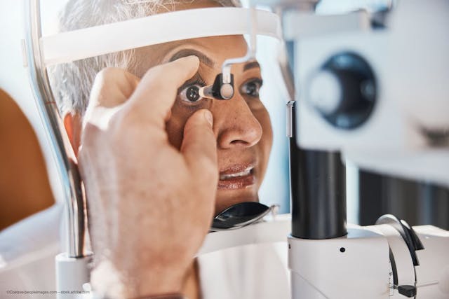 Woman receives glaucoma exam following iDose TR procedure - ©Coetzee/peopleimages.com