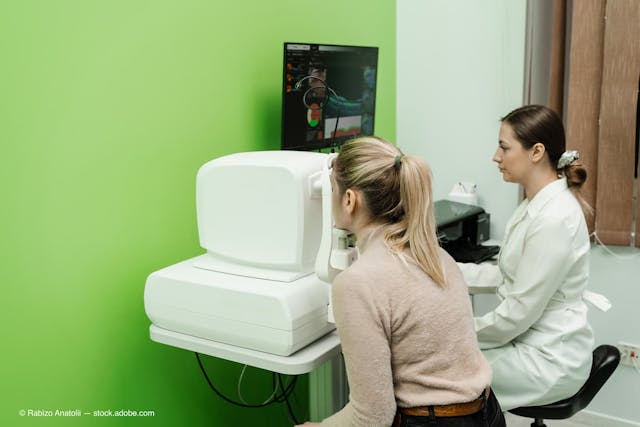Optical coherence tomography OCT scan to create pictures of the back of eye. Examination of eyes of patient using optical coherence tomograph. Ophthalmologist is scanning cornea of woman patient. (Adobe Stock / Rabizo Anatolii)