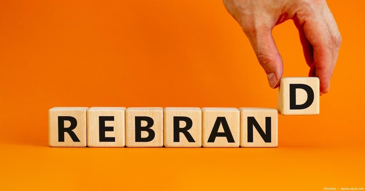 Wooden blocks spelling out "rebrand" on orange backdrop Image Credit: AdobeStock/Dzmitry