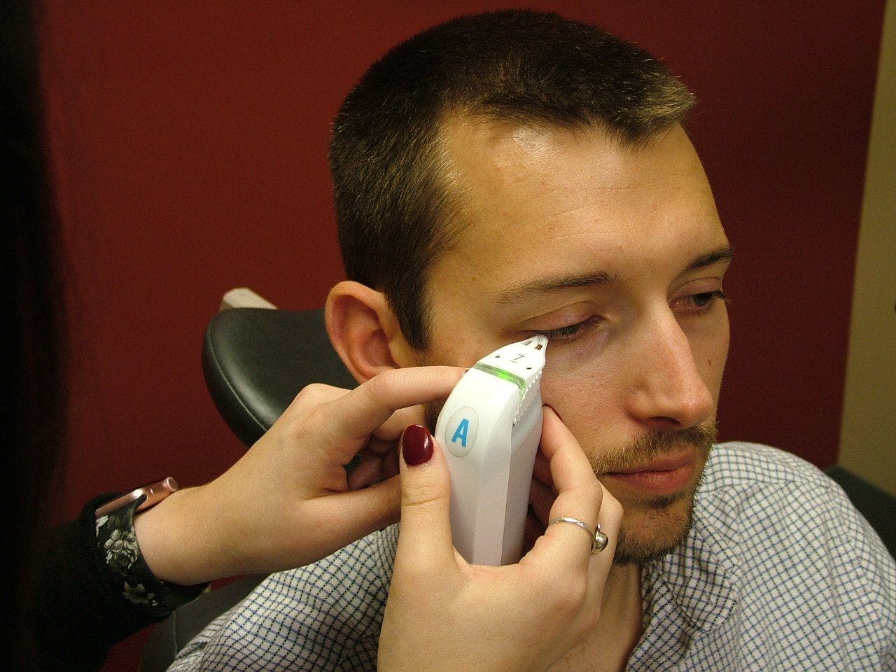 Figure 3. A technician performs TearLab osmolarity testing.