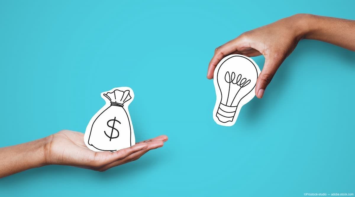 Hands holding graphics of lightbulb and money bag Image Credit: AdobeStock/Prostock-studio