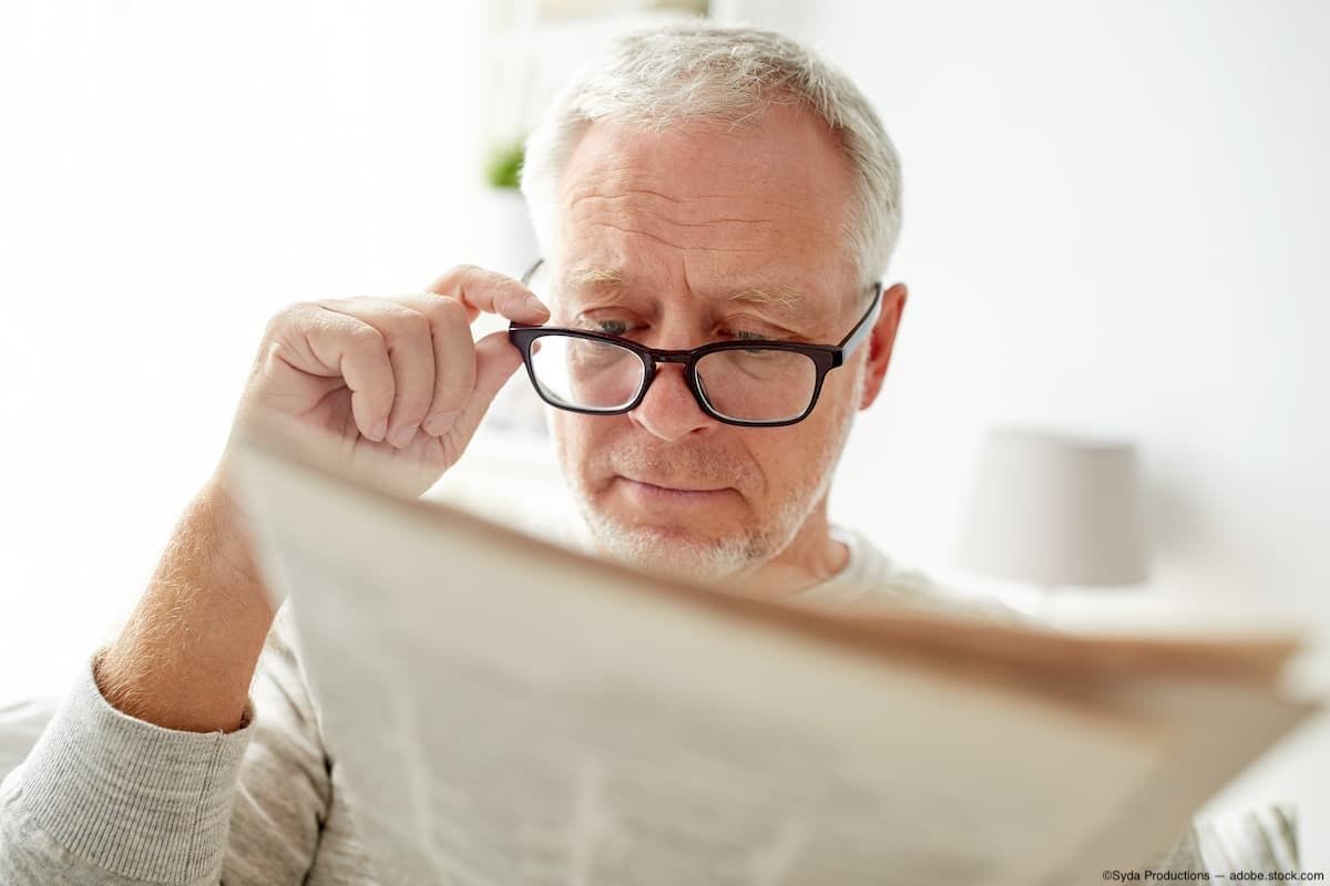 Man with glasses reading newspaper Image credit: ©Syda Productions - adobe.stock.com