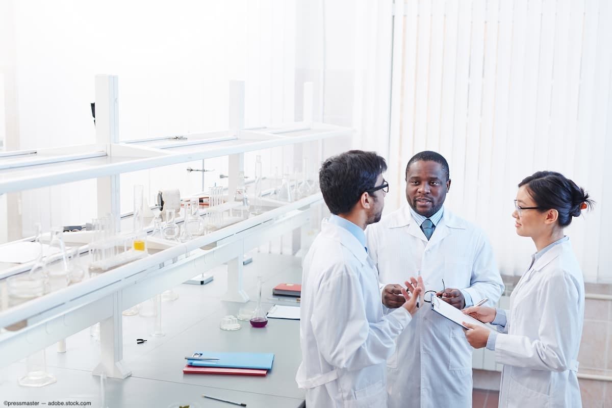 Group of clinical researchers collaborating Image Credit: AdobeStock/pressmaster