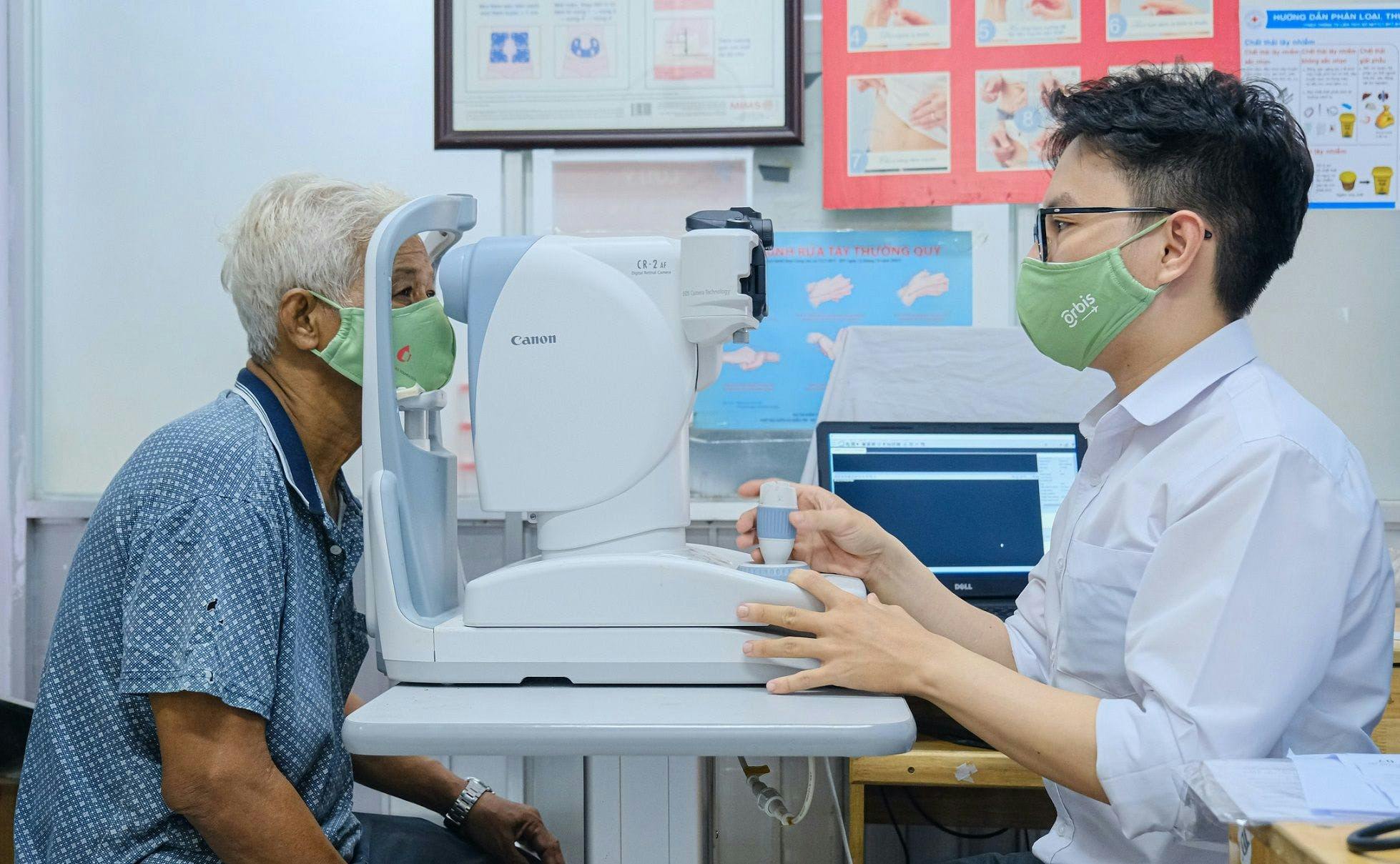 An eye doctor at Orbis Vietnam’s partner hospital Thu Duc Hospital performs an eye examination on a patient with diabetes. (Images courtesy of Orbis International)